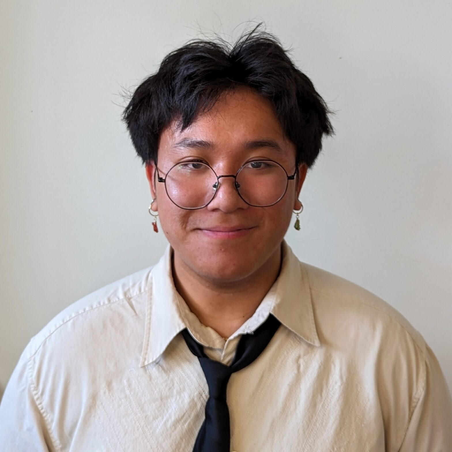 headshot of Phil Tran